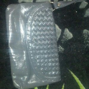 A cute clutch gray bag